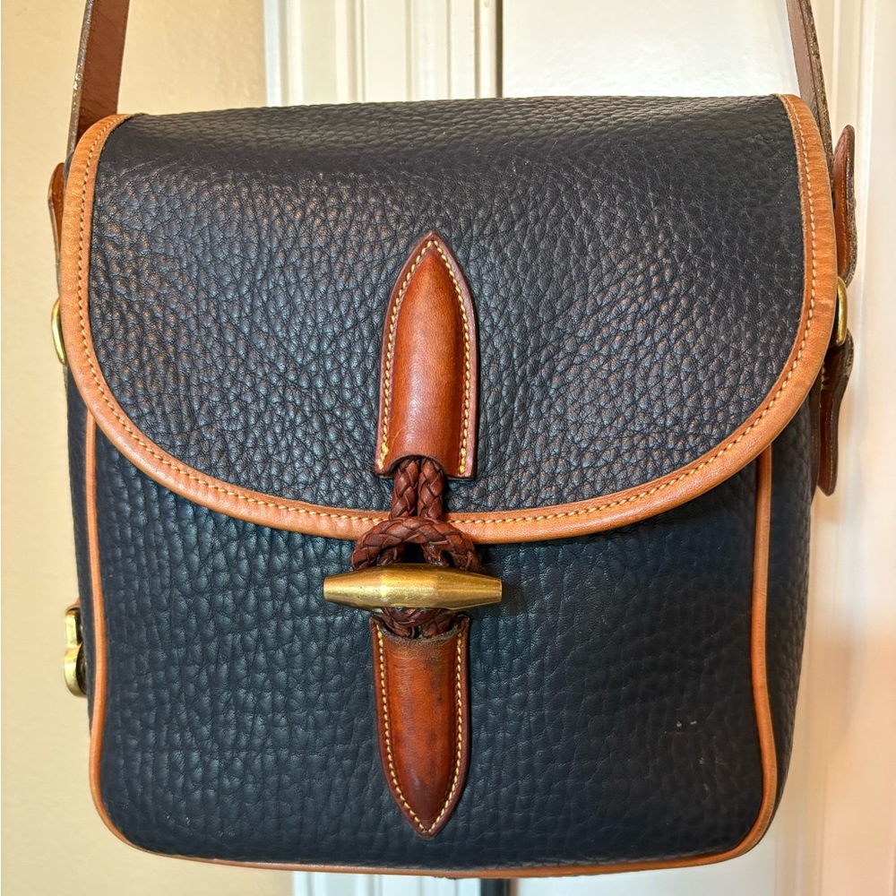Vintage Dooney & Bourke Navy and Brown crossbody in pebbled All Weather Leather